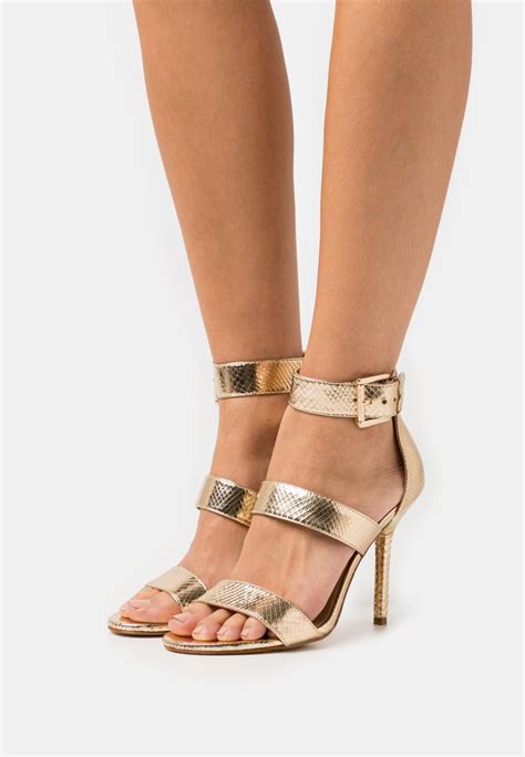 michael kors slipper gold|michael kors heeled sandals.